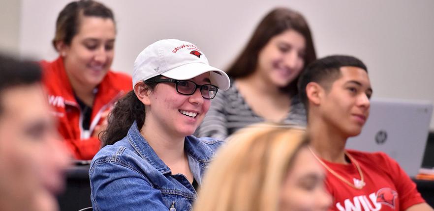 HEBSBA student smiling in UIW business class