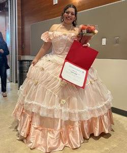 Gabby Maya in a pink ball gown